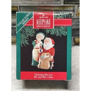 Hallmark 1991 Checking His List Mr. and Mrs. Claus Santa Christmas Ornament